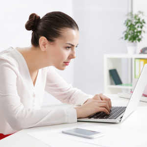 Sitting poorly at the desk can lead to neck pain.